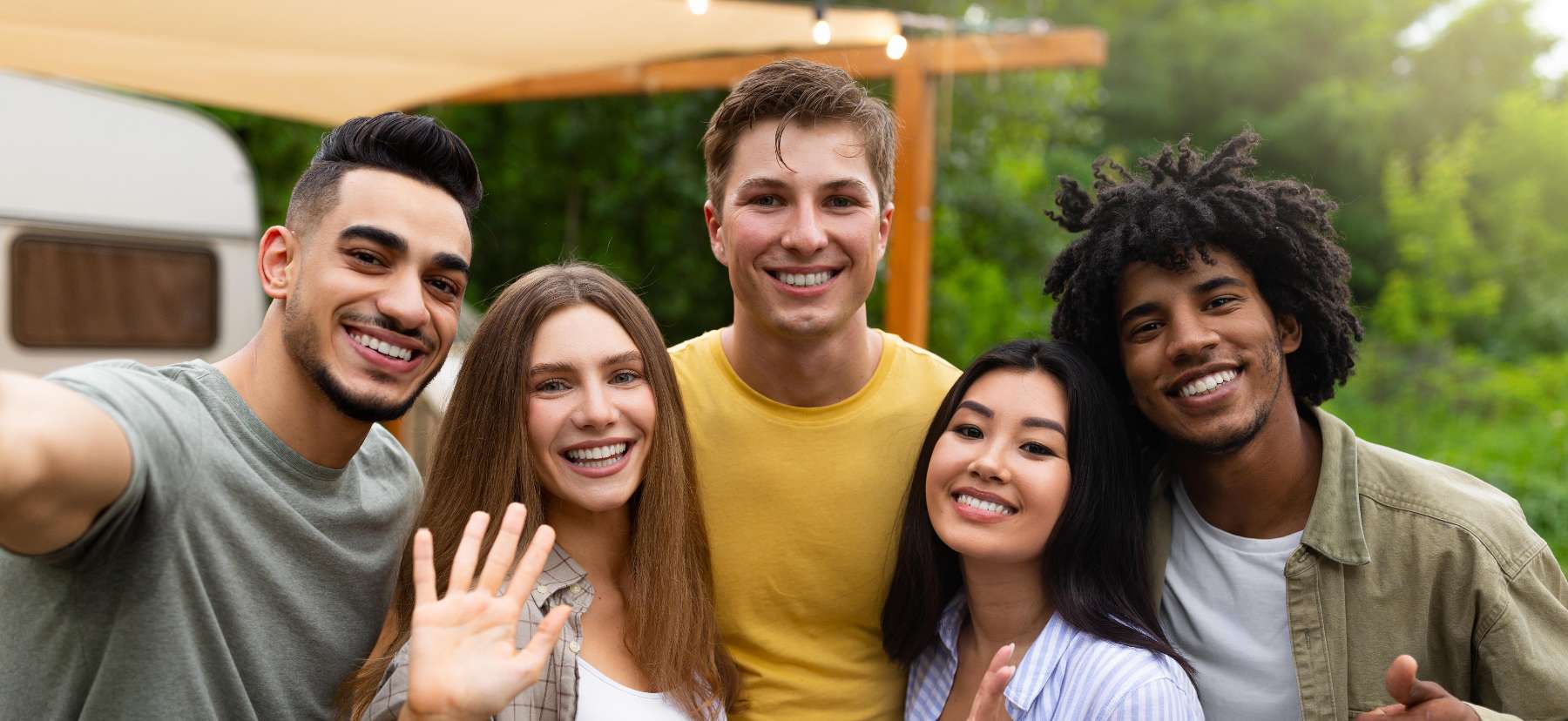 A group of friends taking a picture at the park