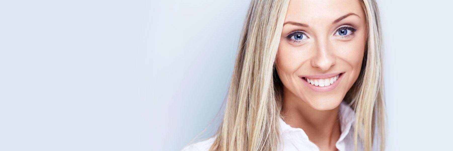 A woman smiling | teeth cleaning Vancouver