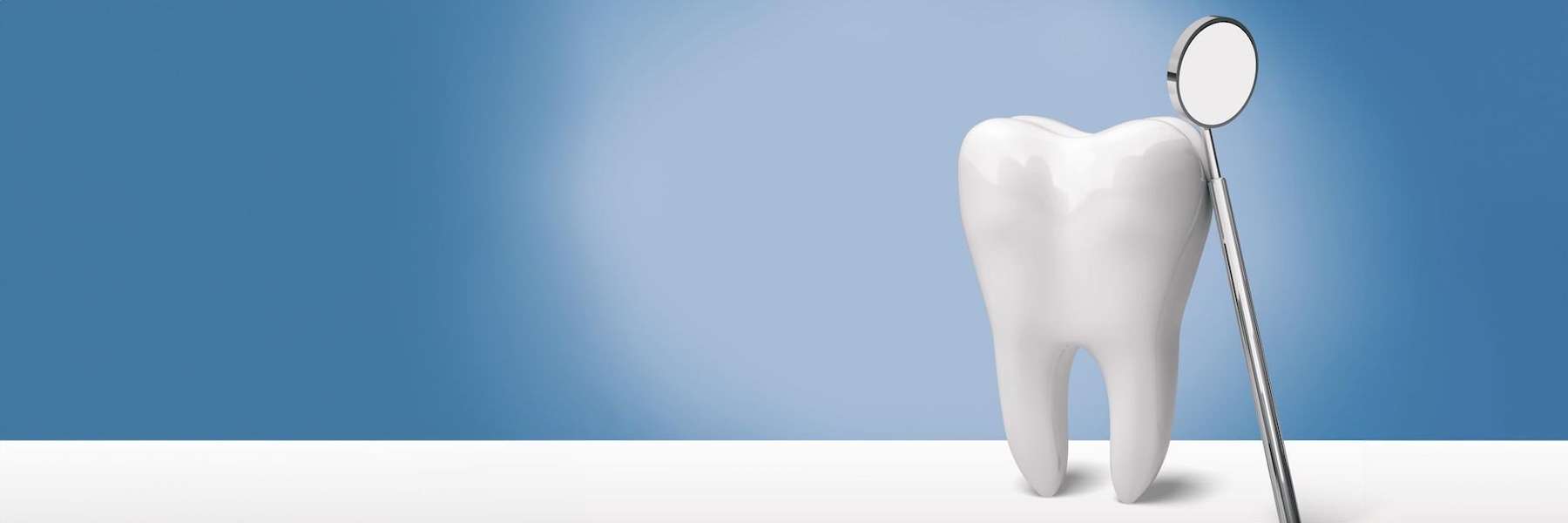 A tooth and dental mirror