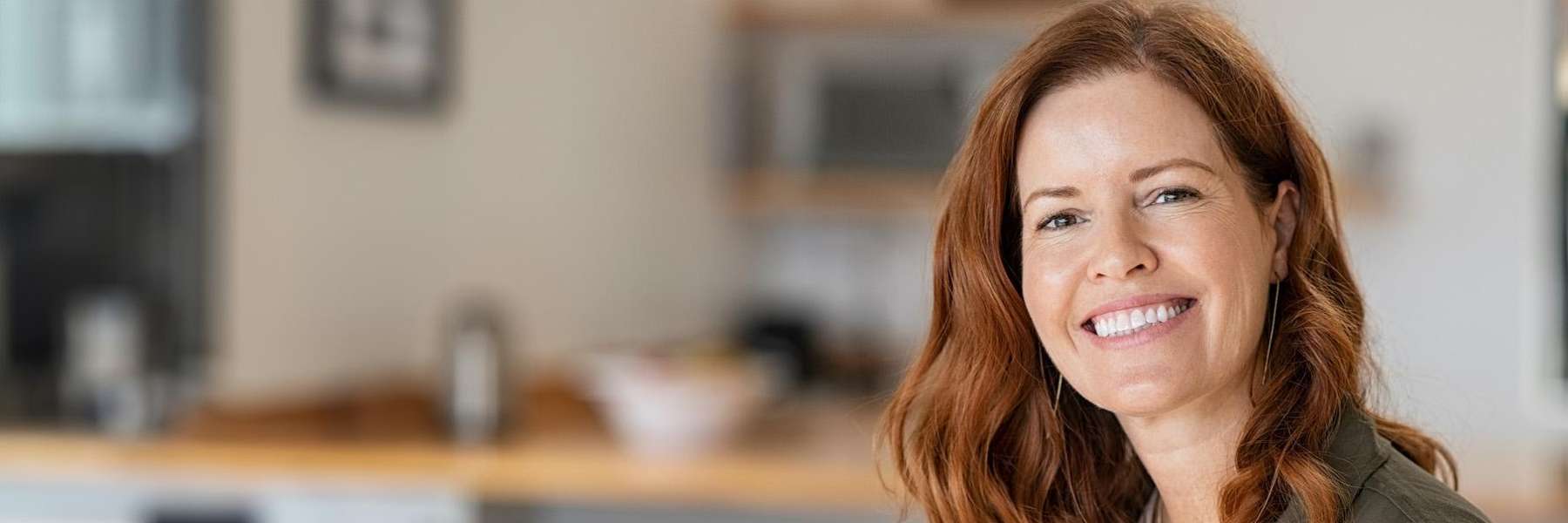 A woman smiling in an office 