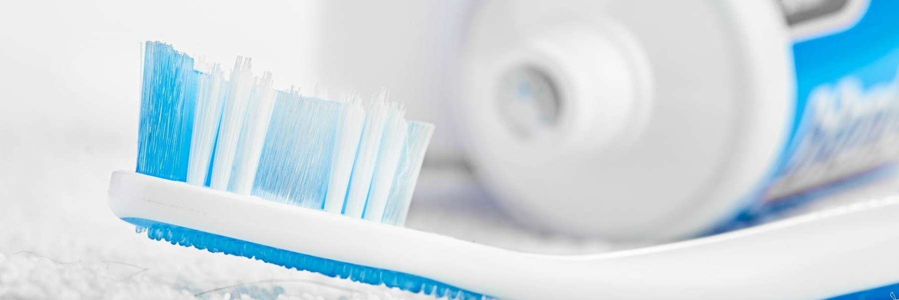 A toothbrush and toothpaste | Dentist in Vancouver