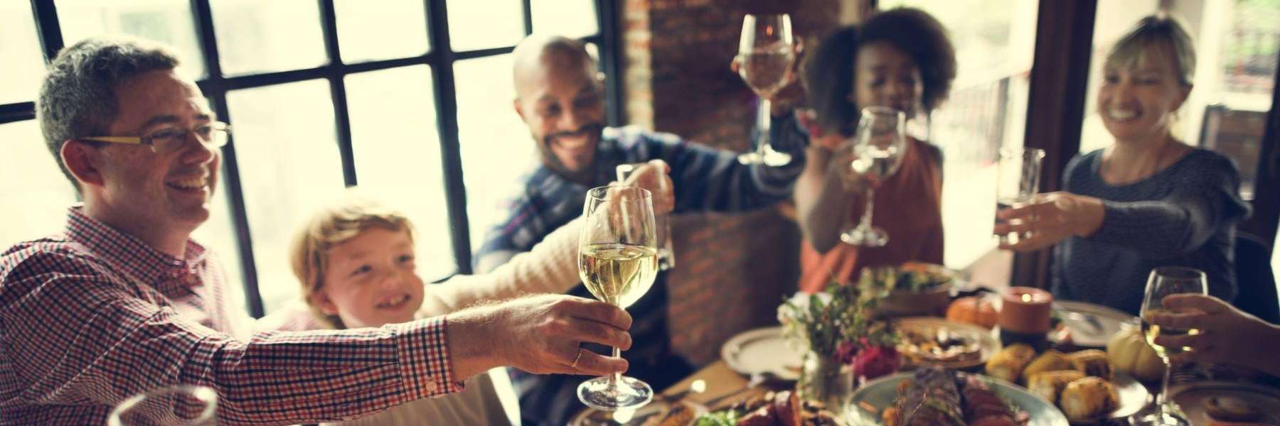 Families having dinner | Vancouver dentist