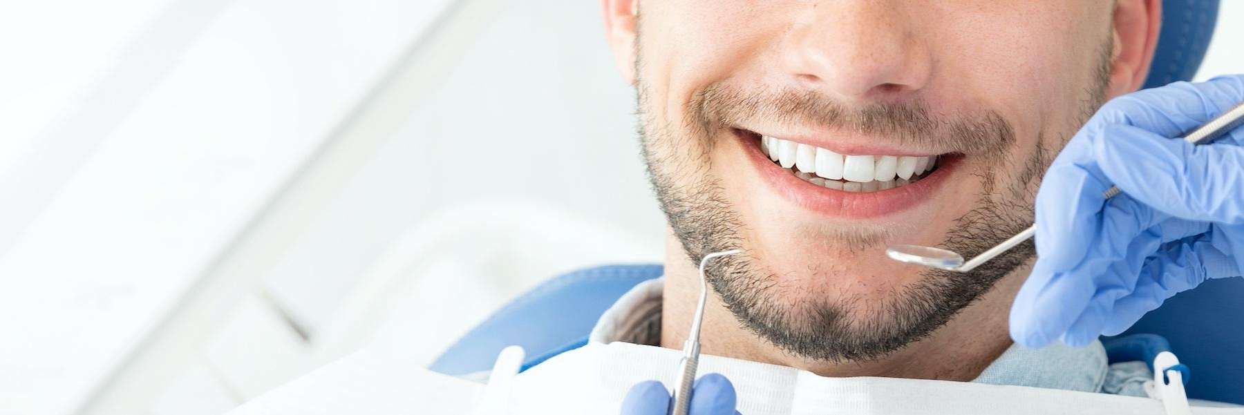A man receiving a dental exam