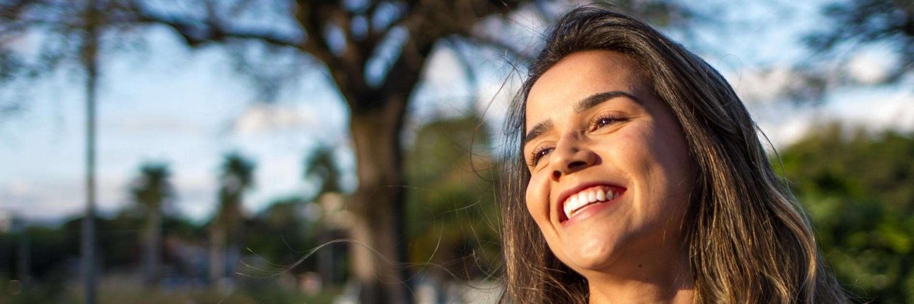 woman smiling after cosmetic dentistry